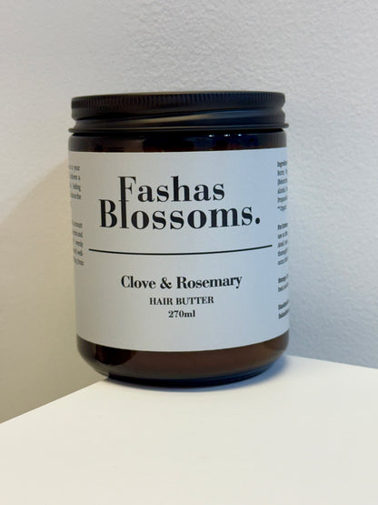 Jar of Fashas Blossoms Clove & Rosemary Hair Butter on a white surface with a light gray background