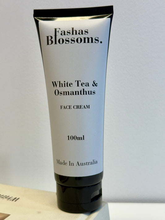 Tube of Fashas Blossoms White Tea & Osmanthus Face Cream on a light gray background